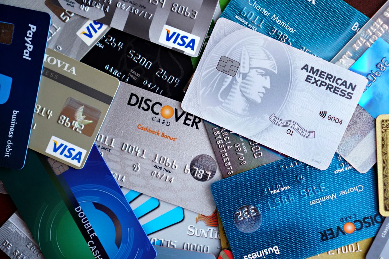 Services Close-up image of various credit cards including Visa, Mastercard, and American Express.